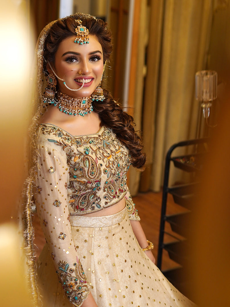 beige colored lehenga choli embellished bridal dress