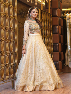 beige colored lehenga choli embellished bridal dress