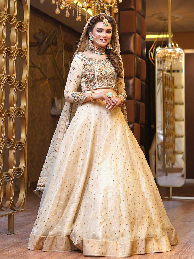 beige colored lehenga choli embellished bridal dress