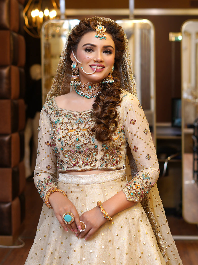 beige colored lehenga choli embellished bridal dress